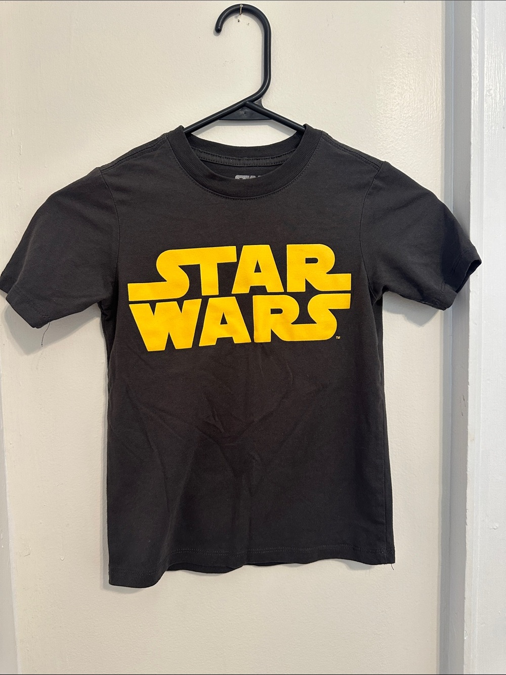 Star Wars Black Tee with Bold Yellow Logo - Kids Short Sleeve